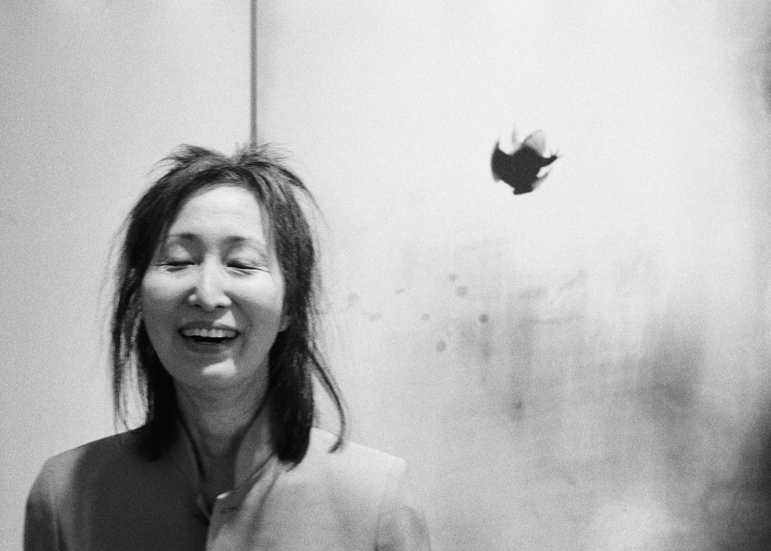 side view of artist with her eyes closed